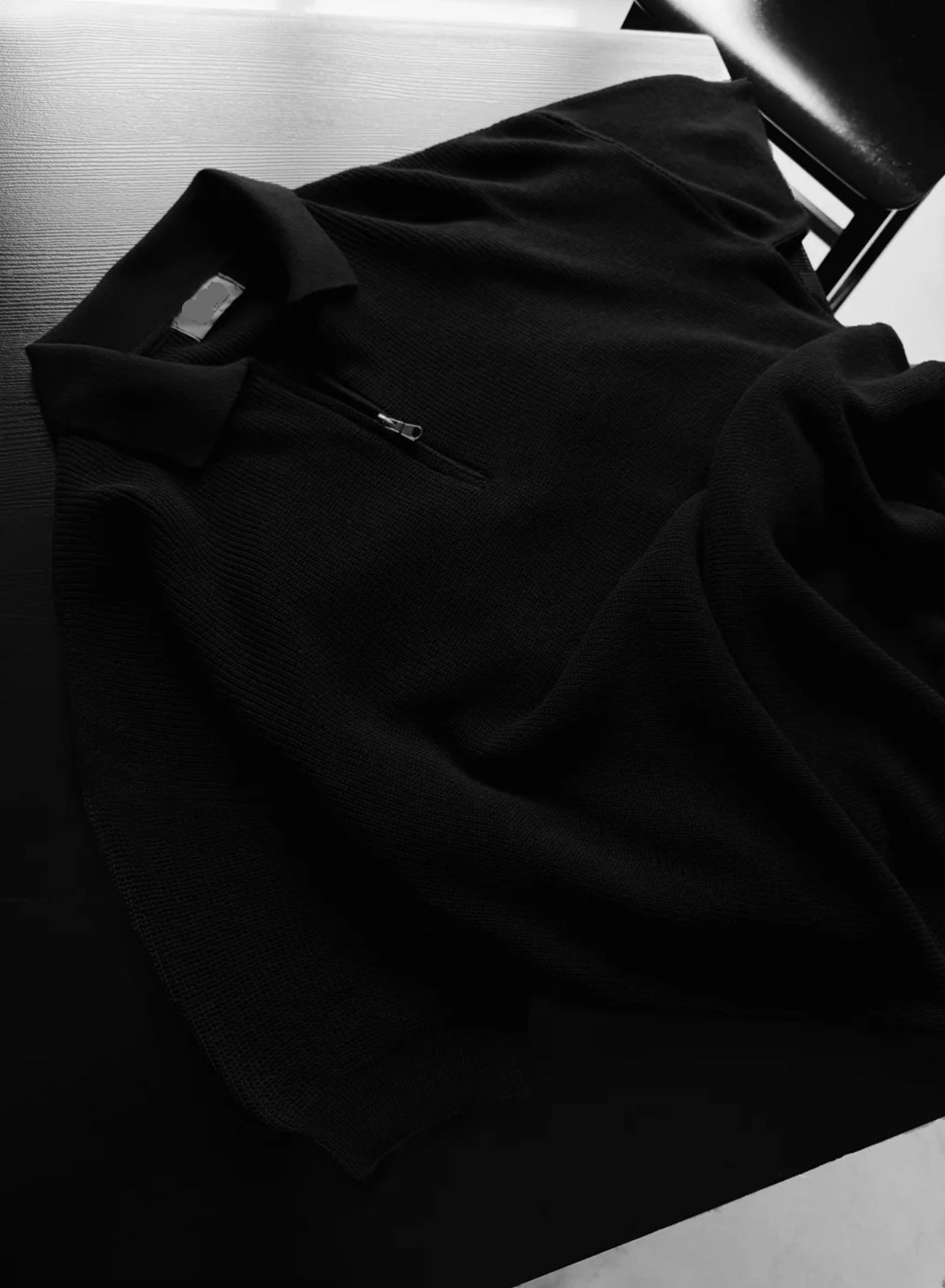 חולצה פולו חצי רוכסן שחור